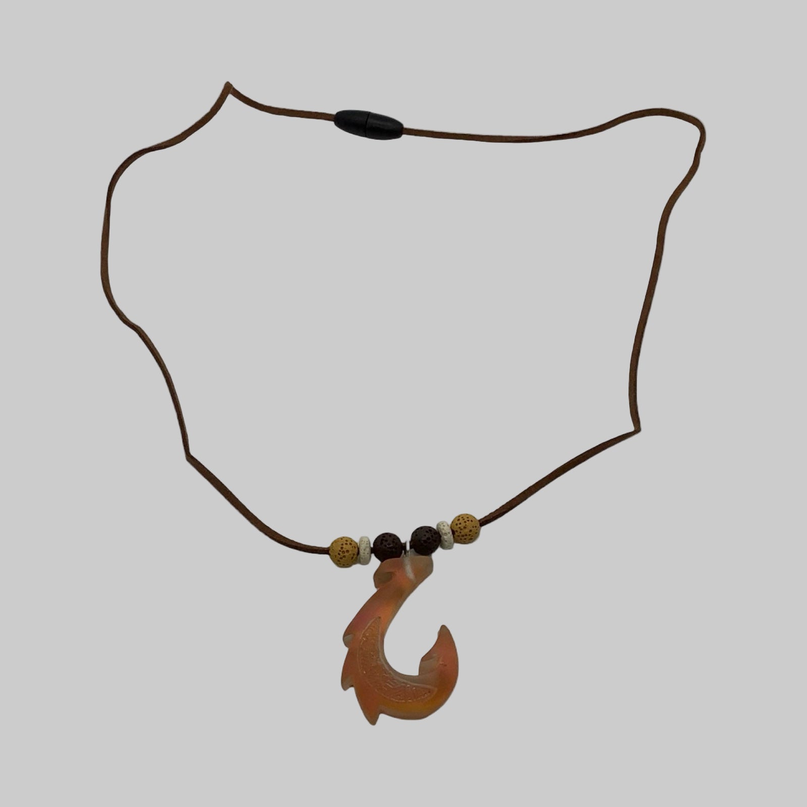 Necklace with a fish hook pendant on a white background