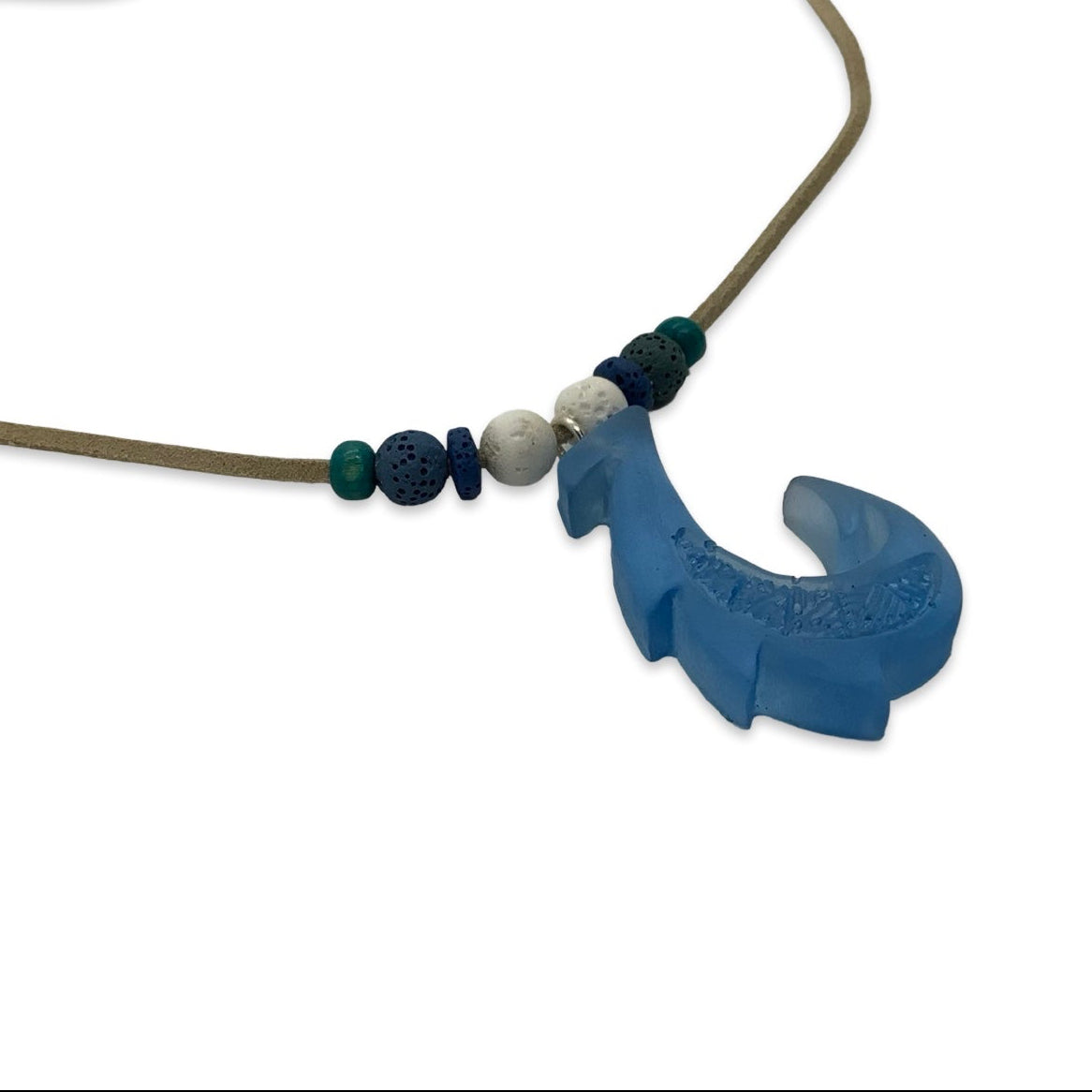 Necklace with blue fish-shaped pendant and beads on a white background