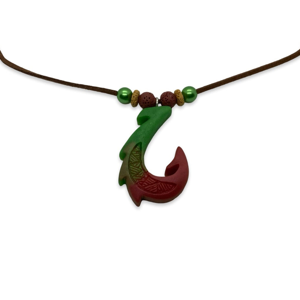 Necklace with a green and red fish hook pendant on a white background