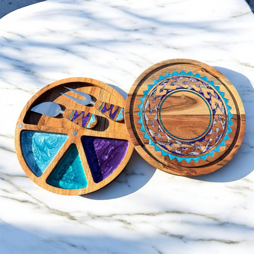 Wooden cutting board with decorative elements on a marble surface