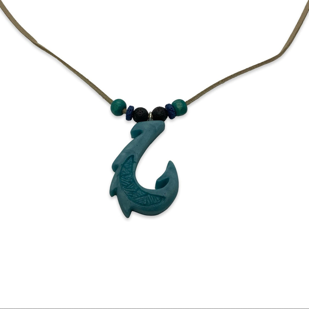 Necklace with a blue fish hook pendant on a white background