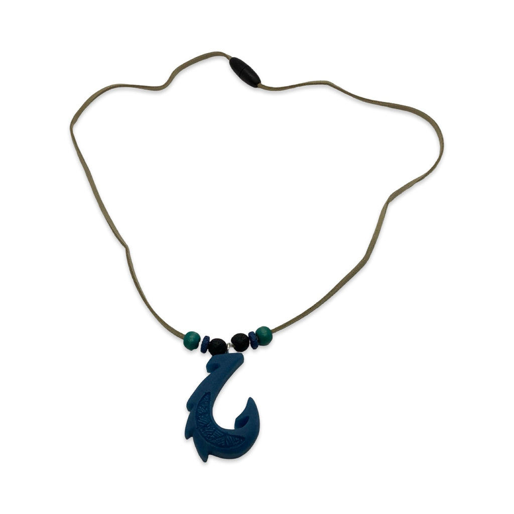 Necklace with a dark blue fish hook pendant on a white background